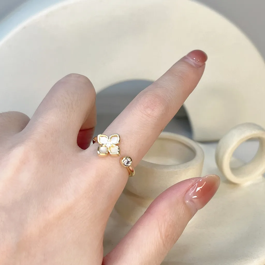 Astria Tiny Flower Stud ring – Gold Finish Crystal Accent ring Astria Jewellery
