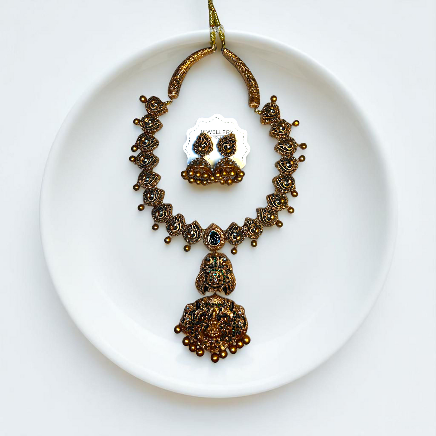 Mrritika Necklace And Earring Handcrafted Temple Jewelry in antique gold finish