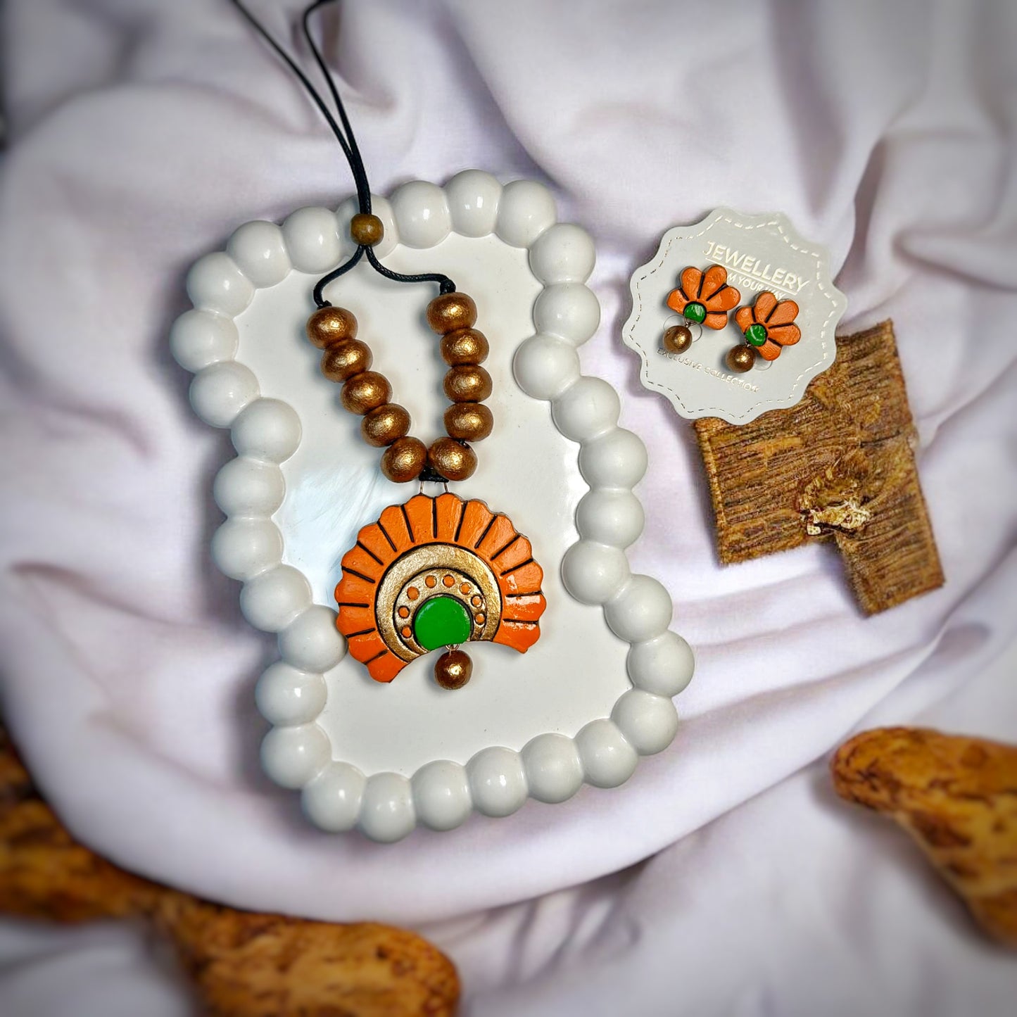 Online Terracotta Modern Boho Jewelry Set Necklace And Earring with orange floral design and green detailing by Mrritika