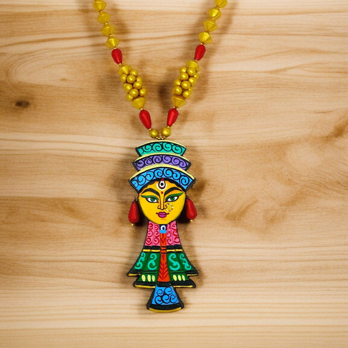 Colorful handcrafted pendant necklace with traditional design and yellow beaded chain by Mrritika Handmade jewelry