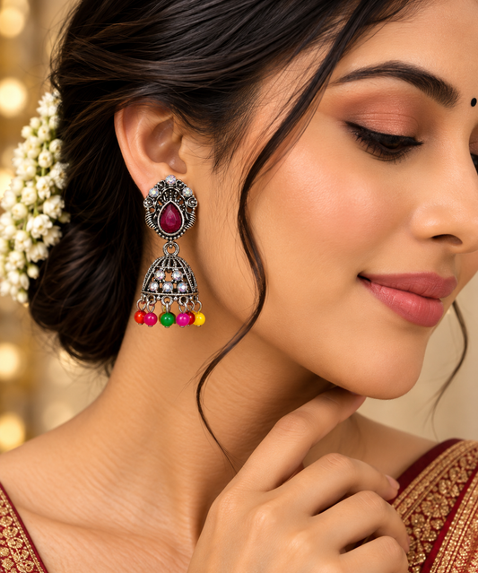 Oxidized Silver-Plated Magenta Stone Studded Traditional Jhumka Earrings ASTRIA JEWELLERY