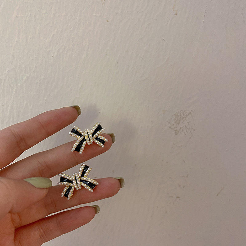 Astria Jewellery Black Cross Bow Statement Earrings for Women | Gold Plated Crystal Studded Designer Earrings | Bold Party Wear & Fashion Jewellery