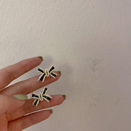Astria Jewellery Black Cross Bow Statement Earrings for Women | Gold Plated Crystal Studded Designer Earrings | Bold Party Wear & Fashion Jewellery