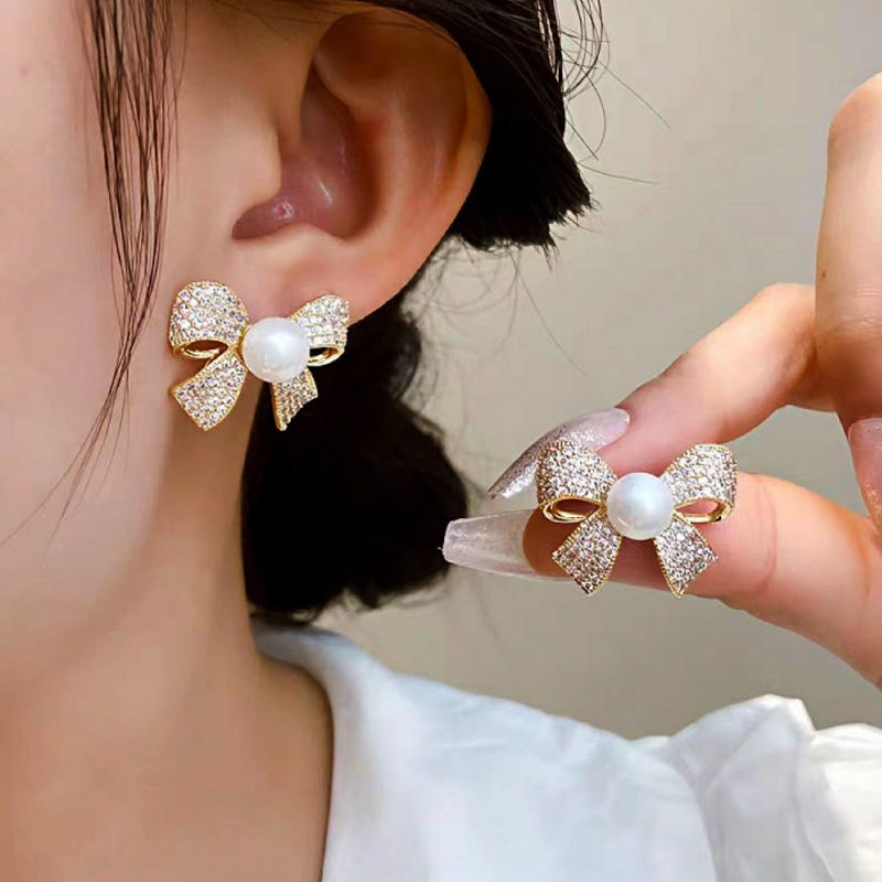 Astria Jewellery Crystal Bow Pearl Stud Earrings for Women | Gold Plated Sparkling Bow Earrings | Elegant Party Wear & Cute Daily Wear Jewellery