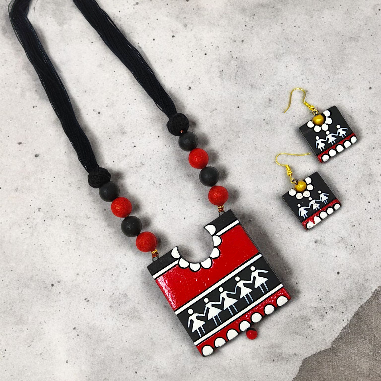 Handcrafted Warli Art Pendent and Earring set with red black white tribal design from Mrritika Handmade Jewelry 