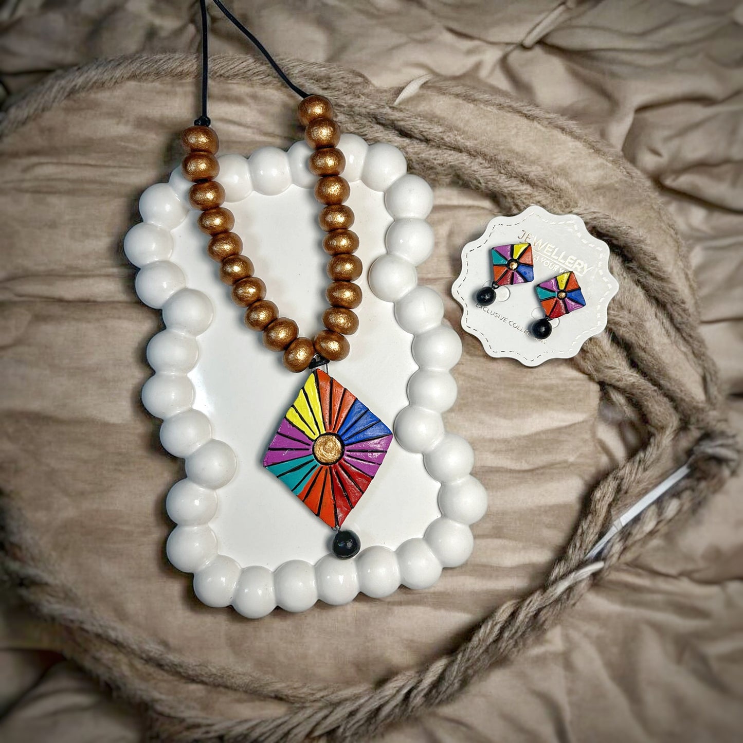 Online Terracotta Jewelry Women Boho Necklace and Earring set with colorful pendant and matching earrings.